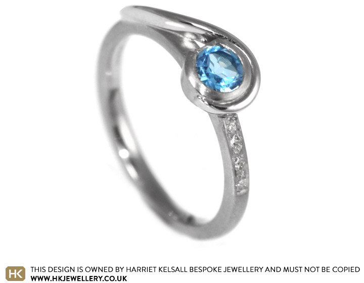 Kirsty's swiss blue topaz and diamond engagement ring