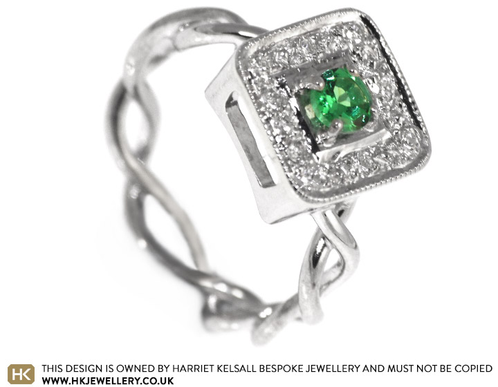 Celtic infinity knot inspired tsavorite and 9 carat white gold engagement ring