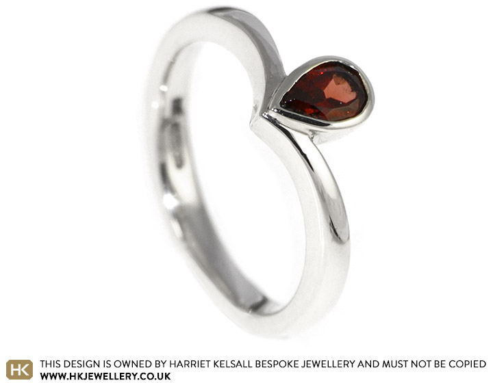 Matt wanted to surprise his partner with a red garnet engagement ring