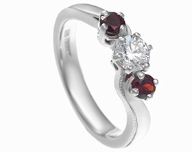 karins-diamond-and-garnet-twist-engagement-ring-11419_1.jpg