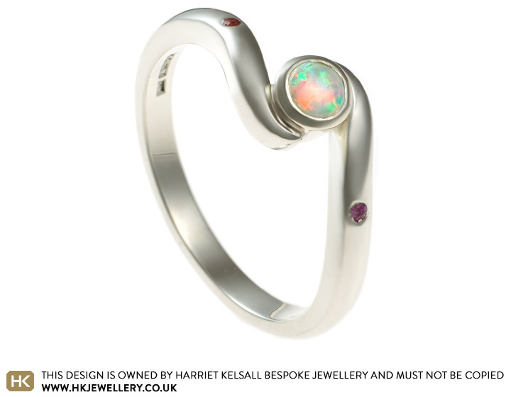 Naomi's opal and 9ct white gold twist engagement ring