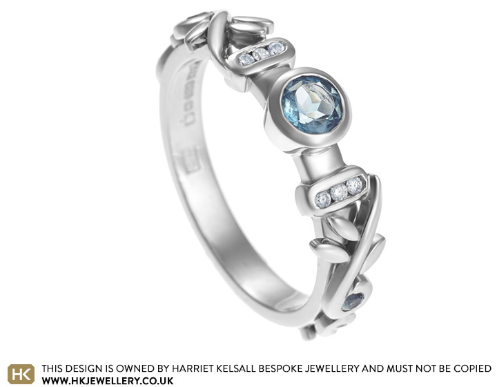 Amy's dramatic topaz and diamond palladium engagement ring