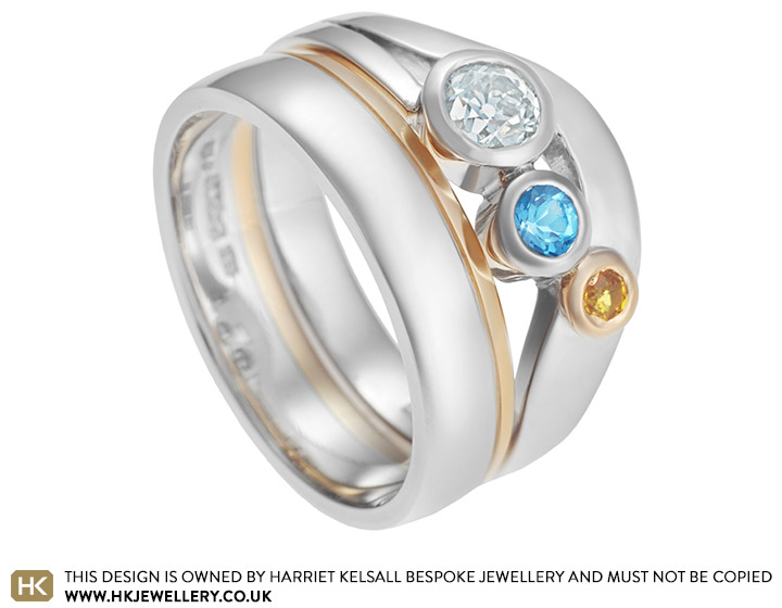 Nathalie's asymmetric engagement and wedding ring set