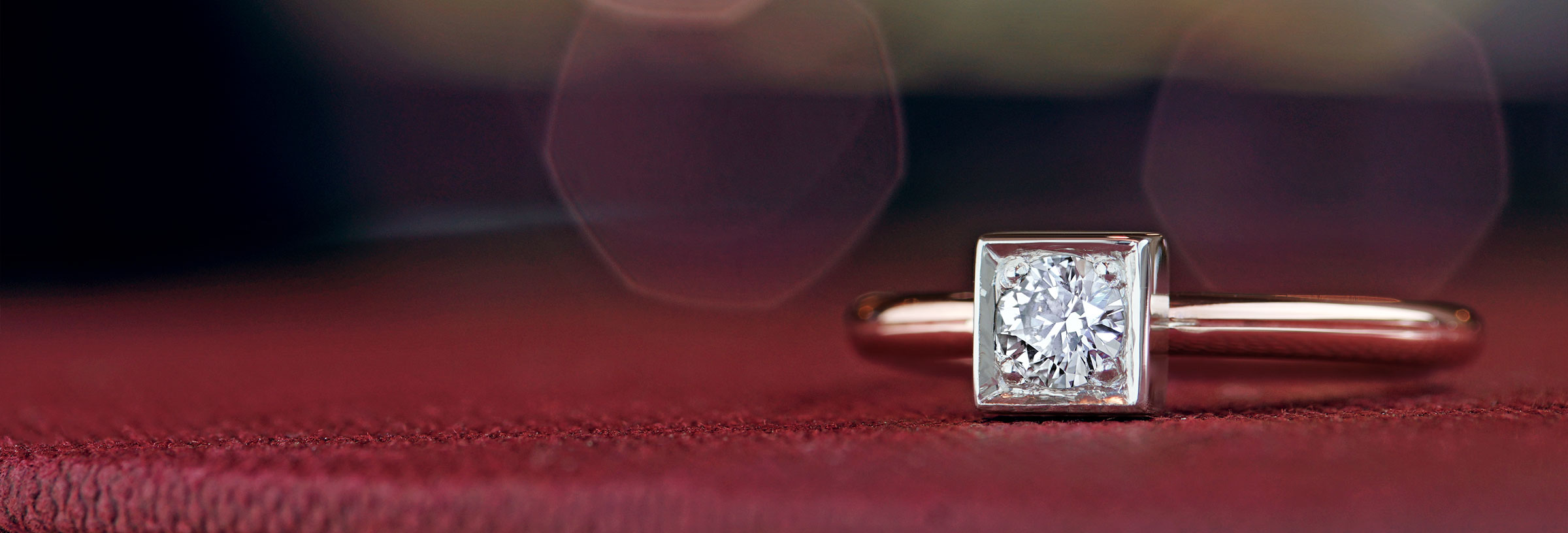 Mixed metal and 0.24ct diamond engagement ring