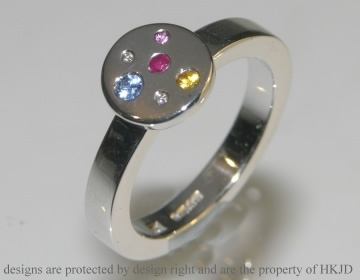 Moon inspired 9 carat white gold and multi coloured gemstone engagement ring