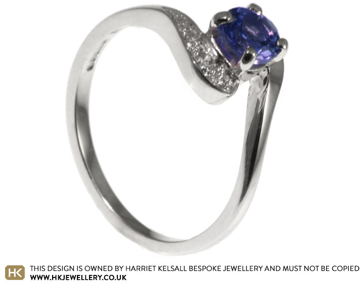 White gold tanzanite and diamond engagement ring