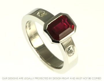 Platinum engagement ring with ruby and customers own diamonds.   