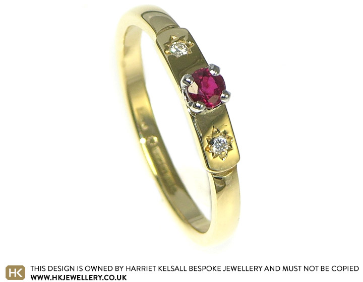 Gold, ruby and diamond 18ct gold and platinum engagement ring.