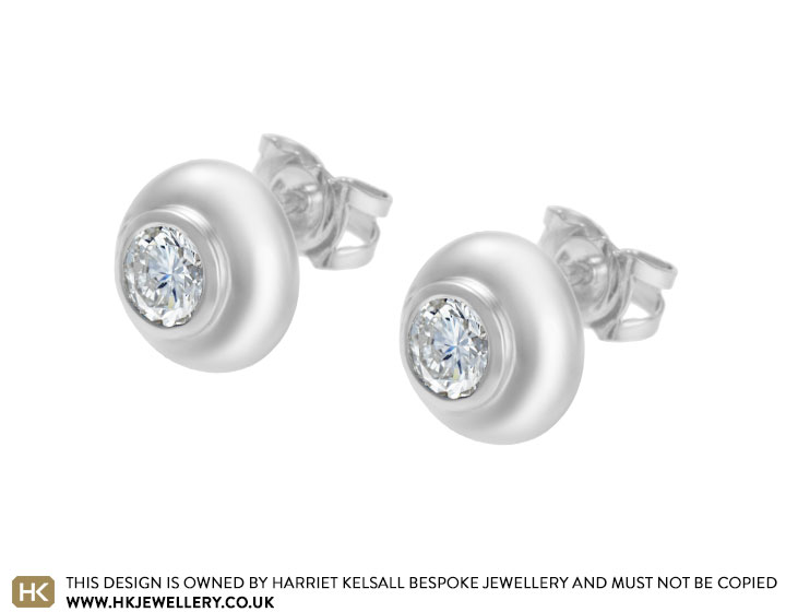 Emma's 9 carat white gold and diamond earrings