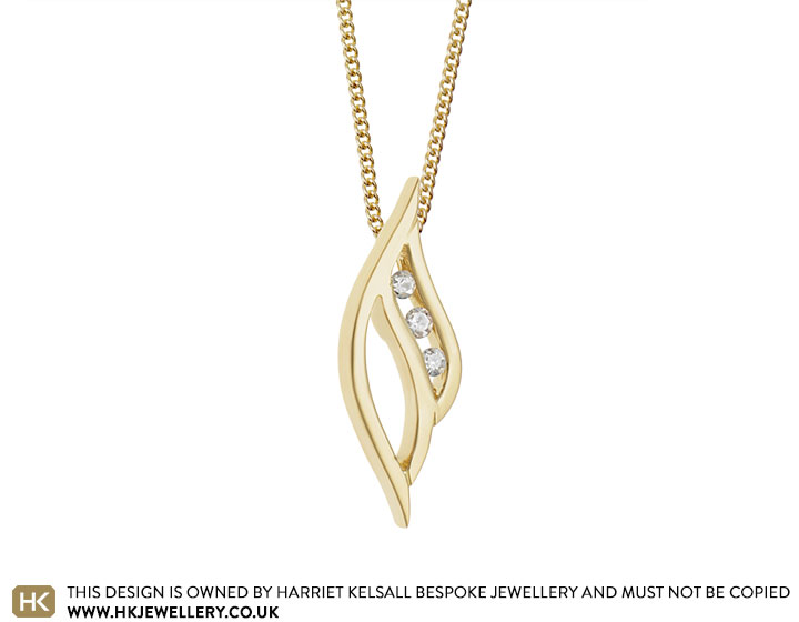 Lorna's water inspired yellow gold and diamond pendant