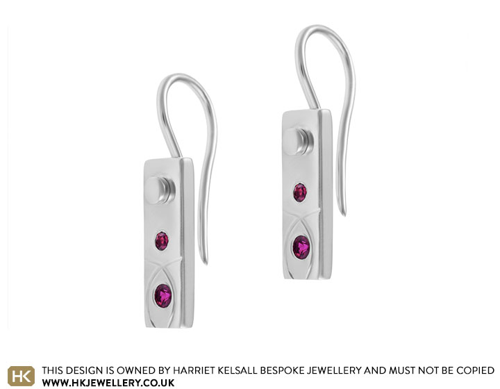 9 carat white gold and ruby drop earrings