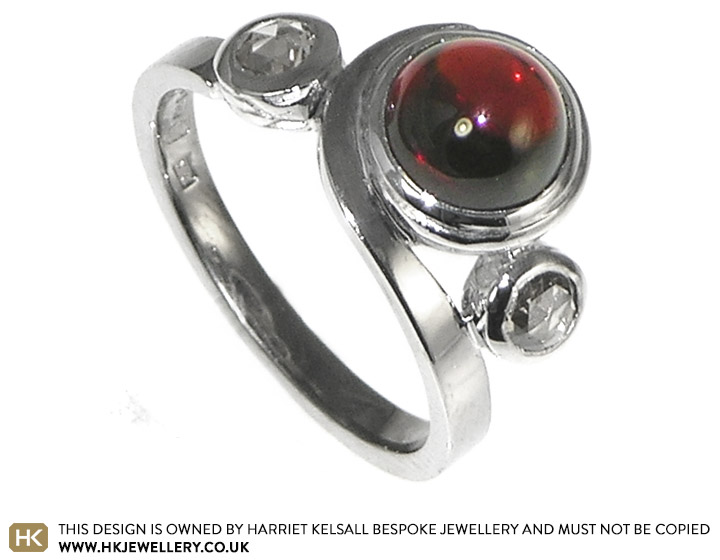 Charlie and Kevin's bespoke garnet engagement ring