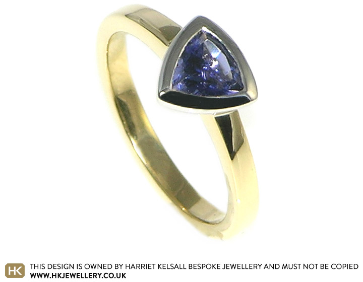 Bespoke 18ct yellow and white gold engagament ring with a Iolite