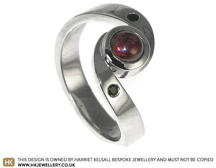 Bespoke palladium engagement ring with the customer's own garnet