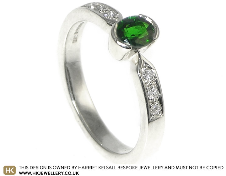 9ct white gold engagement ring set with an oval green Tsavorite and diamonds