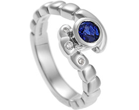 13695-palladium-sapphire-and-diamond-twist-style-engagement-ring_1.jpg