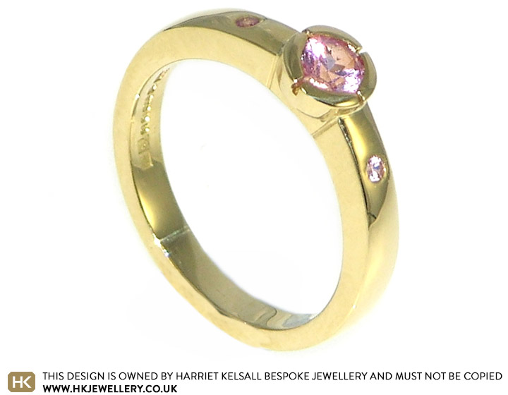 Chris and Lindsay's pink sapphire engagement ring