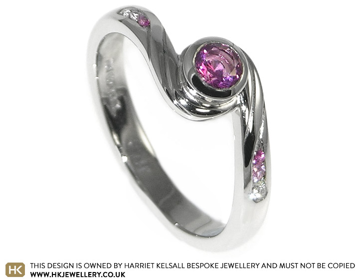 Charlotte's stunning hot pink sapphire engagement ring