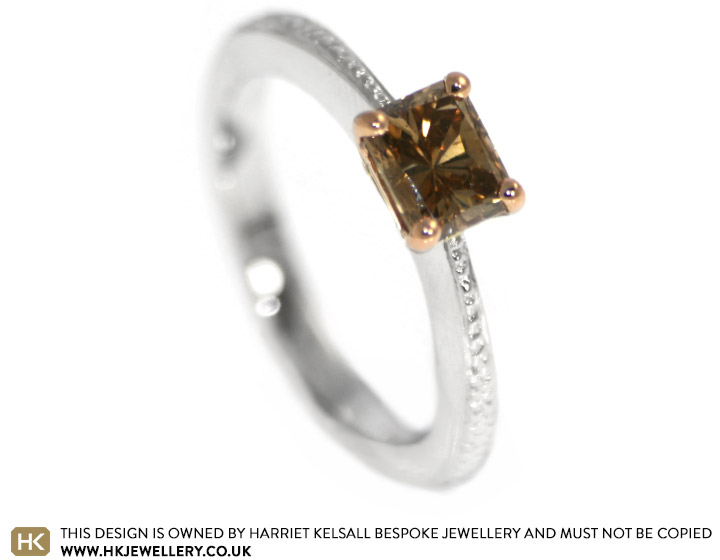 Rose's emerald cut cognac diamond engagement ring