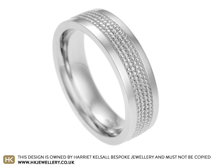 Jason's palladium wedding band with a beaded strip