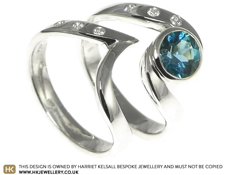 Twist style engagement and wedding ring set in 9ct white gold with topaz and diamonds