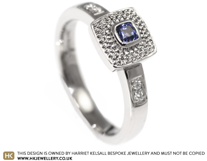 Alice's cushion cut sapphire and diamond engagement ring