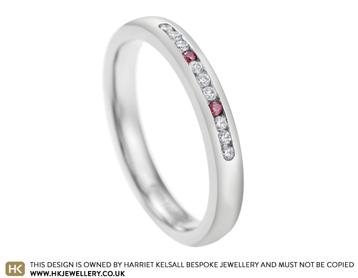 Palladium eternity ring channel set with clear and pink diamonds