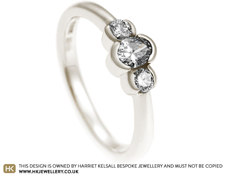 Imogen's oval and brilliant cut diamond engagement ring