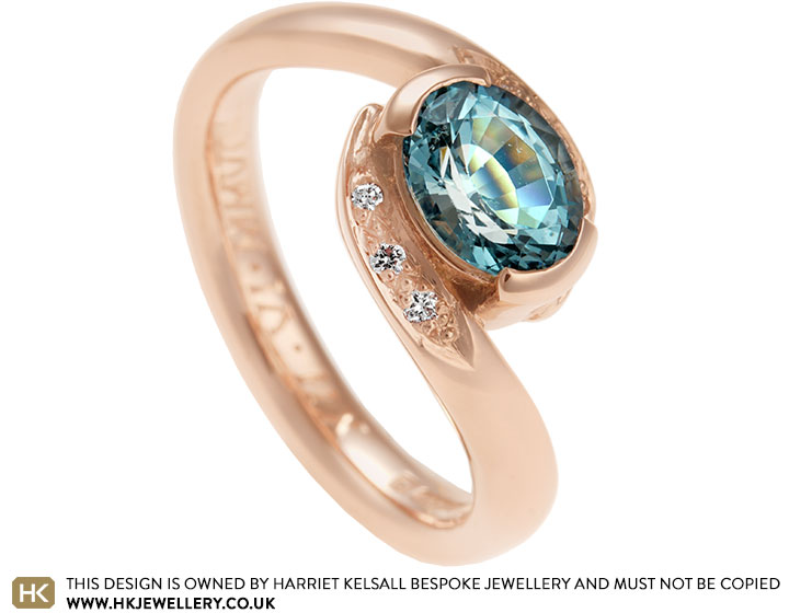 Adela's Fairtrade rose gold and aquamarine wave inspired engagement ring