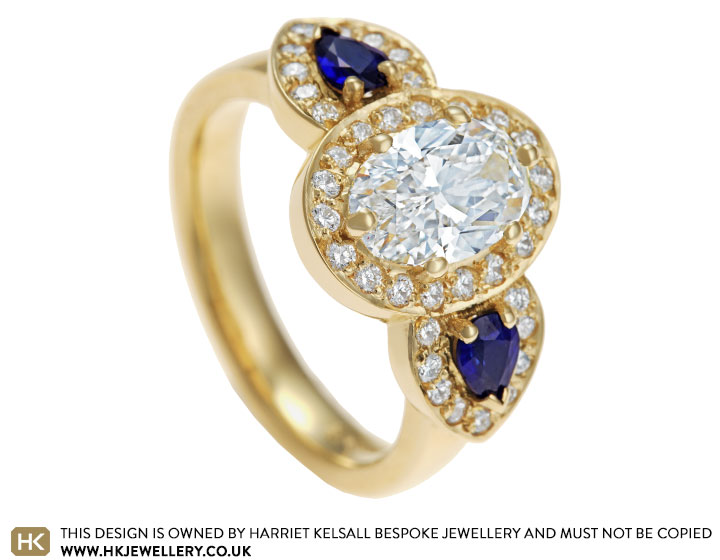 Yubing's Fairtrade 18 carat yellow gold diamond and sapphire engagement ring