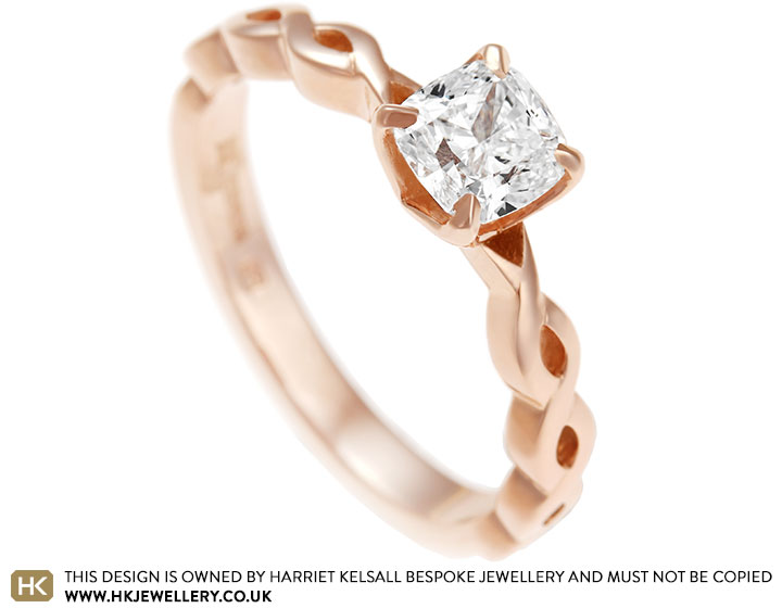 Amanda's Fairtrade 9 carat rose gold engagement ring with a cushion cut diamond