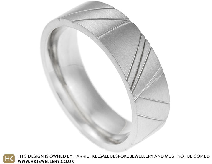 Simon's asymmetric saw cut palladium wedding band