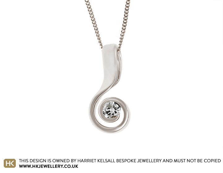 Isabel's 9 carat white gold curl pendant