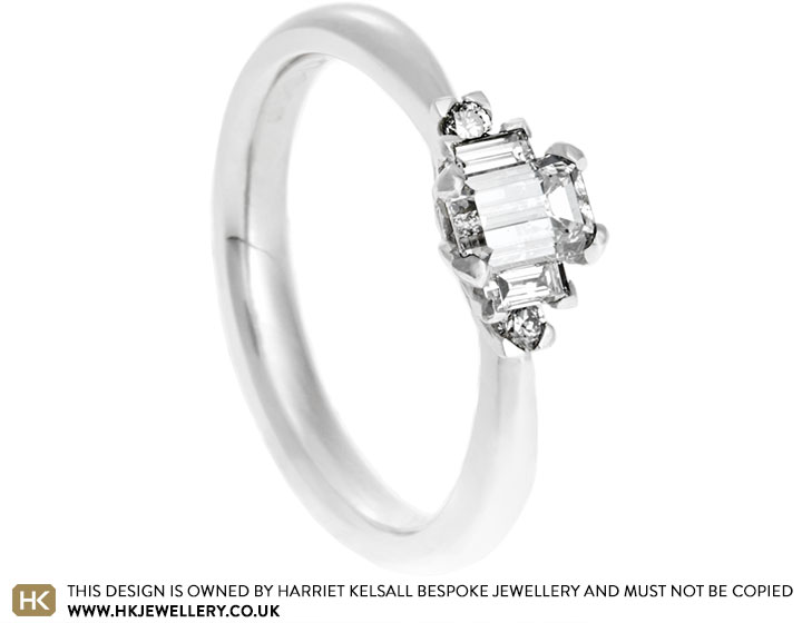 Claire's platinum and multi-cut diamond engagement ring