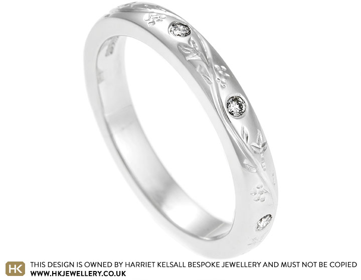 Kathryn's palladium cherry blossom engraved eternity ring