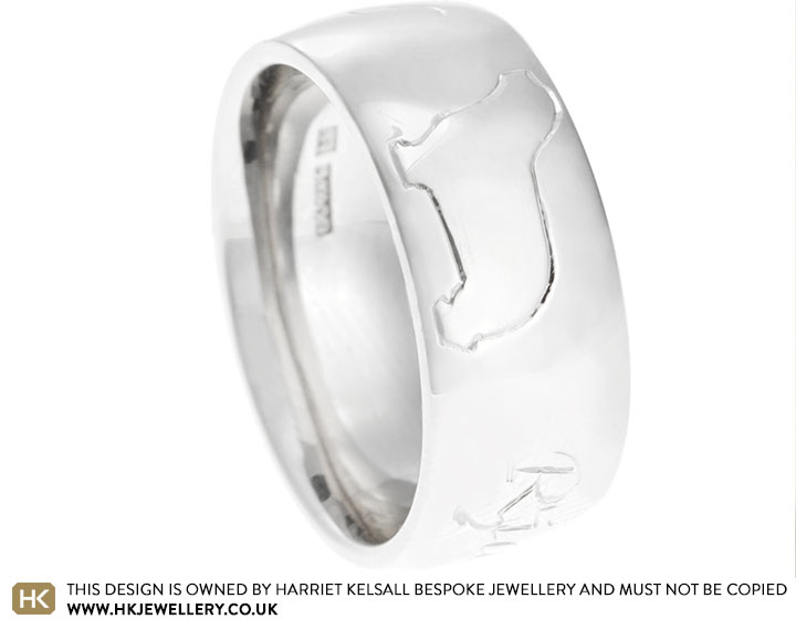 Marilyn's palladium wedding ring with engraving of her Bearded Collie Dog