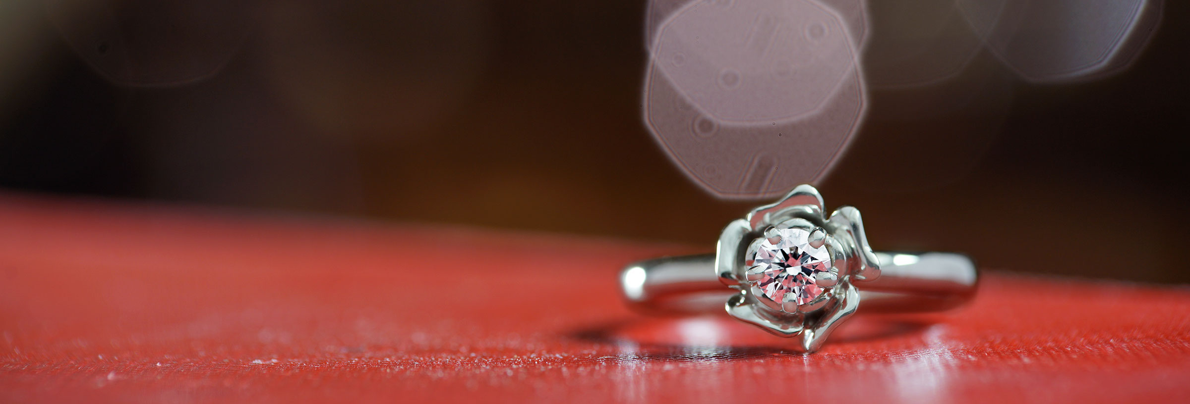 Fairtrade-9-carat-white-gold-rose-inspired-diamond-engagement-ring