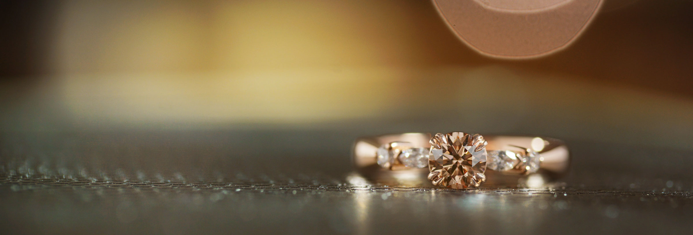 Fairtrade-9-carat-rose-gold-engagement-ring-with-cognac-diamond-centre