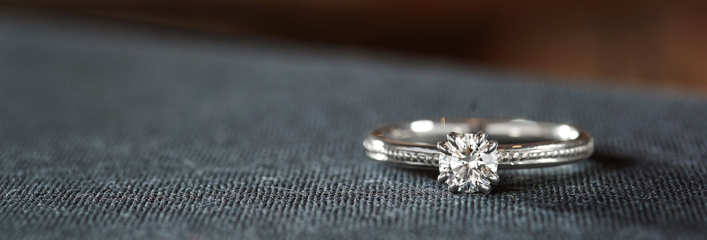 palladium-double-claw-engagement-ring-with-beaded-band