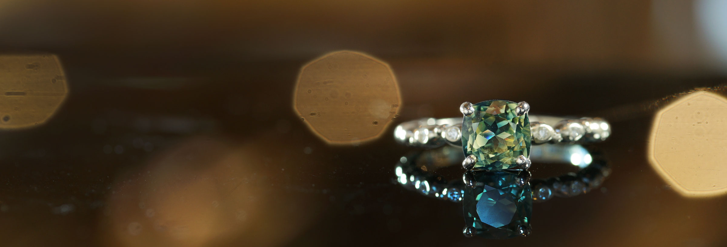 Fairtrade-9-carat-white-gold-botanical-garden-inspired-green-sapphire-ring