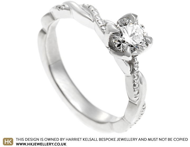 Lizzie's Celtic inspired engagement ring their own central diamond