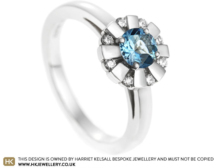 Platinum engagement ring with an aquamarine and round brilliant cut diamonds totalling 0.12ct