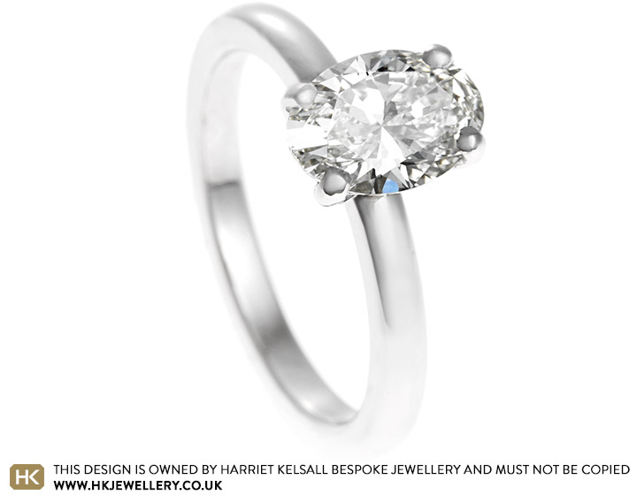 Elisa's Platinum and 1.06ct oval cut diamond engagement ring