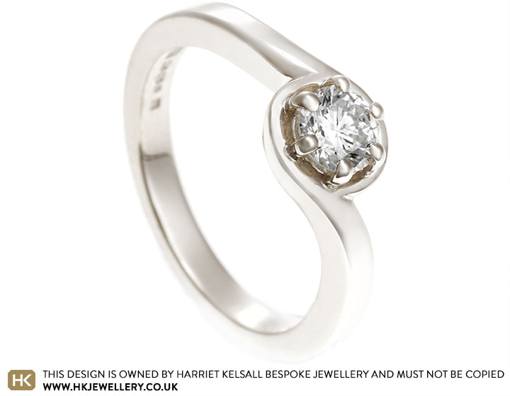 Charlotte's twist design diamond solitaire engagement ring