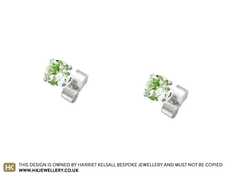 Faceted peridot and sterling silver stud earrings