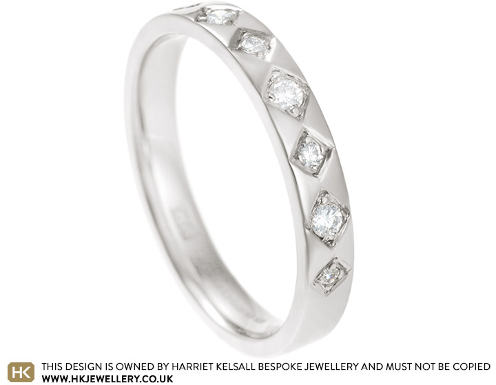 11550-white-gold-eternity-ring-with-grain-set-diamonds_2.jpg
