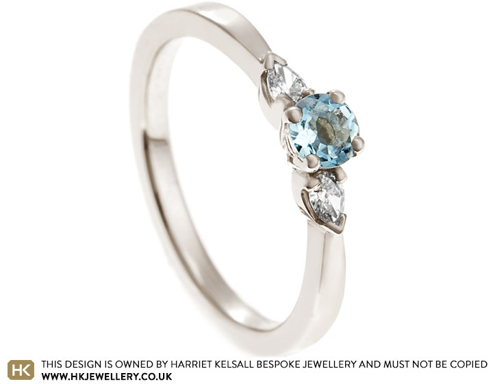 Ryan's aquamarine and pear cut diamond engagement ring