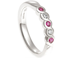 18662-diamond-and-pink-sapphire-white-gold-eternity-ring_1.jpg