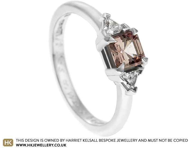 Emma's mink octagon cut garnet and trilliant cut diamond engagement ring