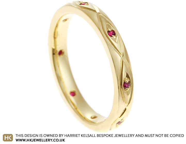 Heather's 18ct yellow gold marquise grain set ruby eternity ring